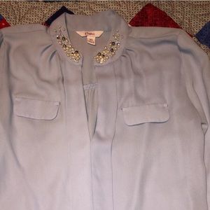 A silk blouse and sweater